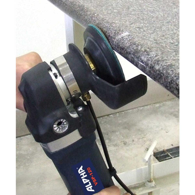 Worker using a Ceramica EX pad on a wet polisher to polish the edge of a bullnose