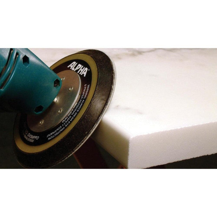 Alpha sandpaper used to polish an edge on marble counter