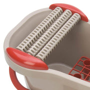 Heavy dury rollers remove water from sponge for a continuous clean sponge