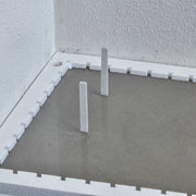 RTC leveling pins used to map self-leveling underlayment depth