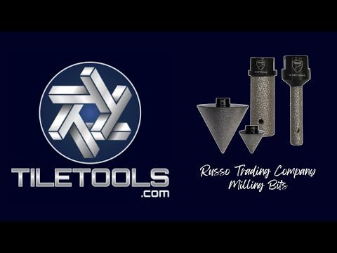 Collection of Russo Trading Company Pro Mill-C Cone Milling Bits and Pro Mill-S Straight Milling Bits displayed alongside ceramic, porcelain, and natural stone samples, illustrating their compatibility and effectiveness for precise and detailed tile cutting.