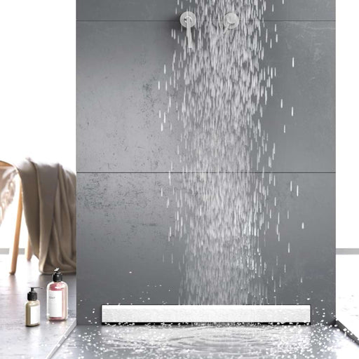 The Gruen WallLine linear drain showcasing its sleek, minimalist design in a modern shower