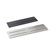 Two rectangular metal wedi shelves, one black and one silver, on a white background.